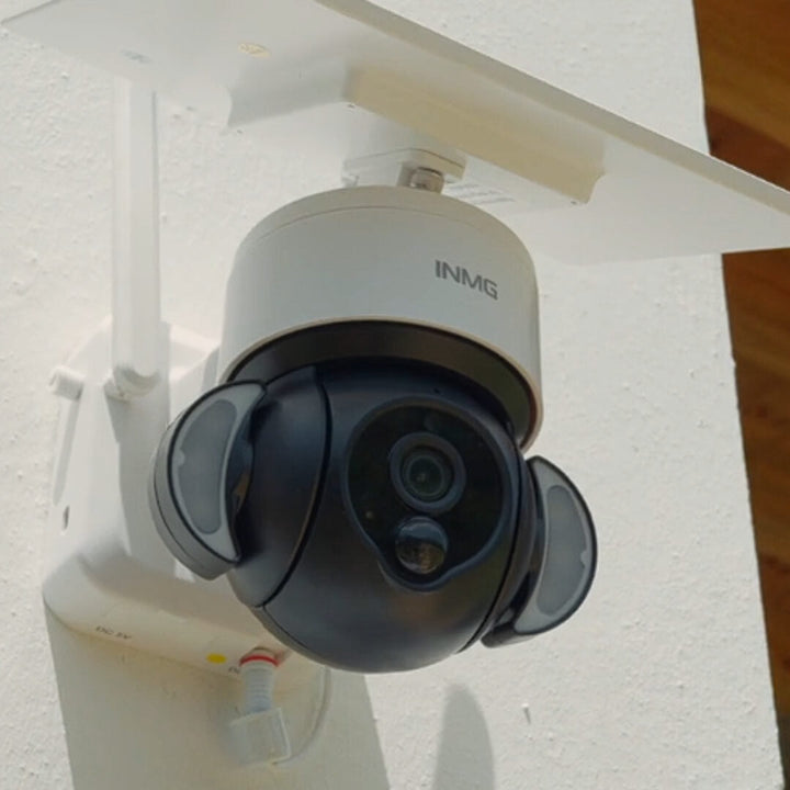 Wireless solar security camera with rotating dome for outdoor home surveillance and protection.