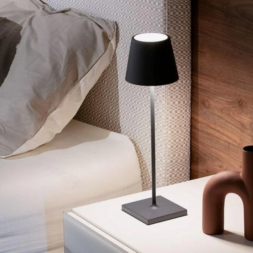 Ambient LED table lamp, LumiFlex, with wireless portability and intuitive touch controls.