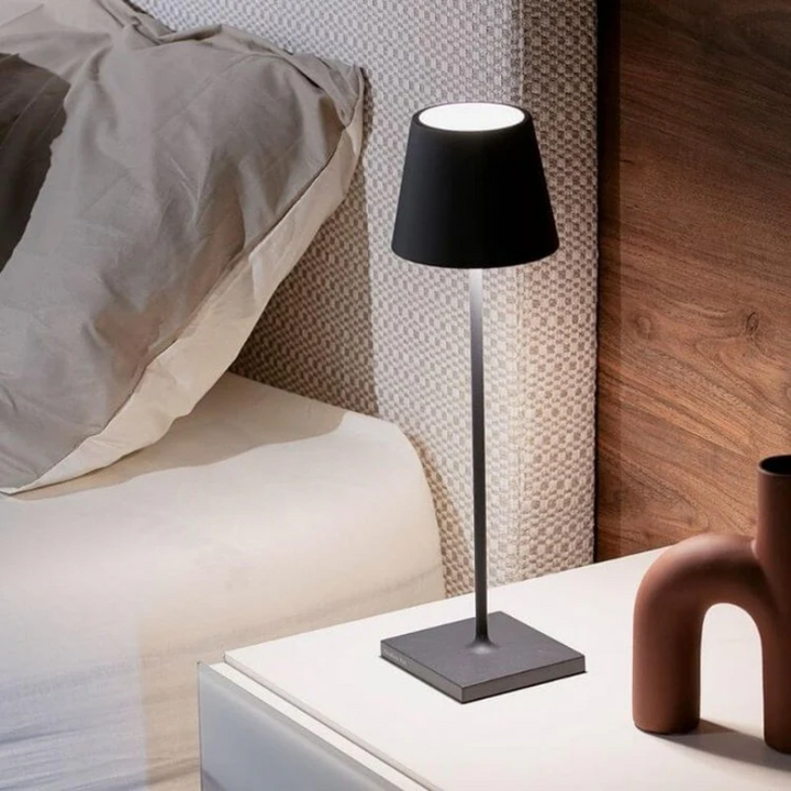 Ambient LED table lamp, LumiFlex, with wireless portability and intuitive touch controls.
