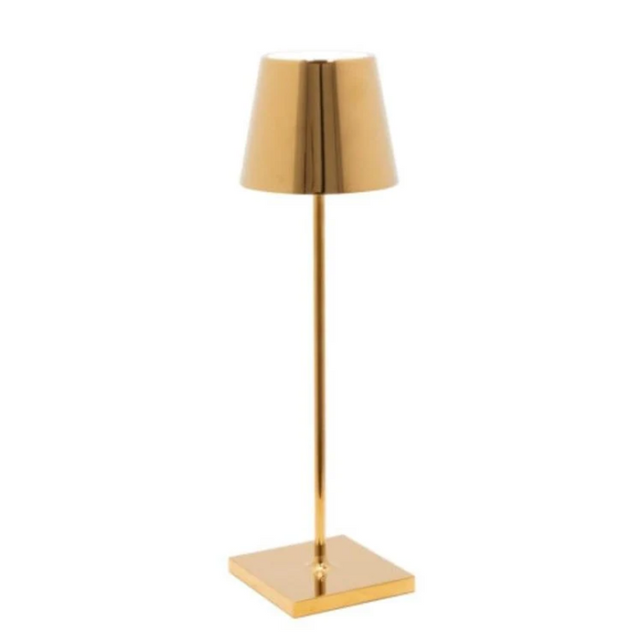 Rechargeable portable LED table lamp, LumiFlex, casting warm mood lighting.