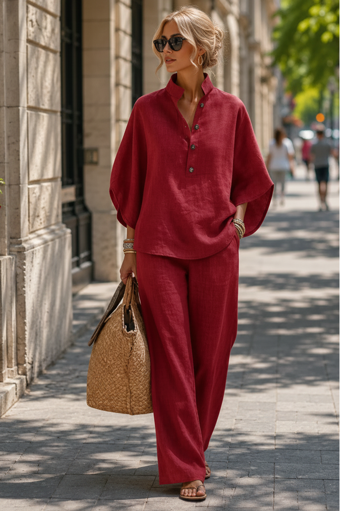 Woman walking in a relaxed fit wide-leg two-piece summer set, showcasing breezy comfort & modern women's fashion.