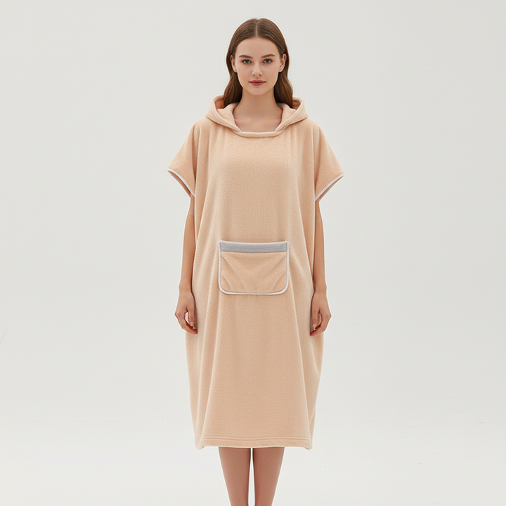 Soft, absorbent quick-dry hooded poncho in a neutral color, ideal for beach or loungewear