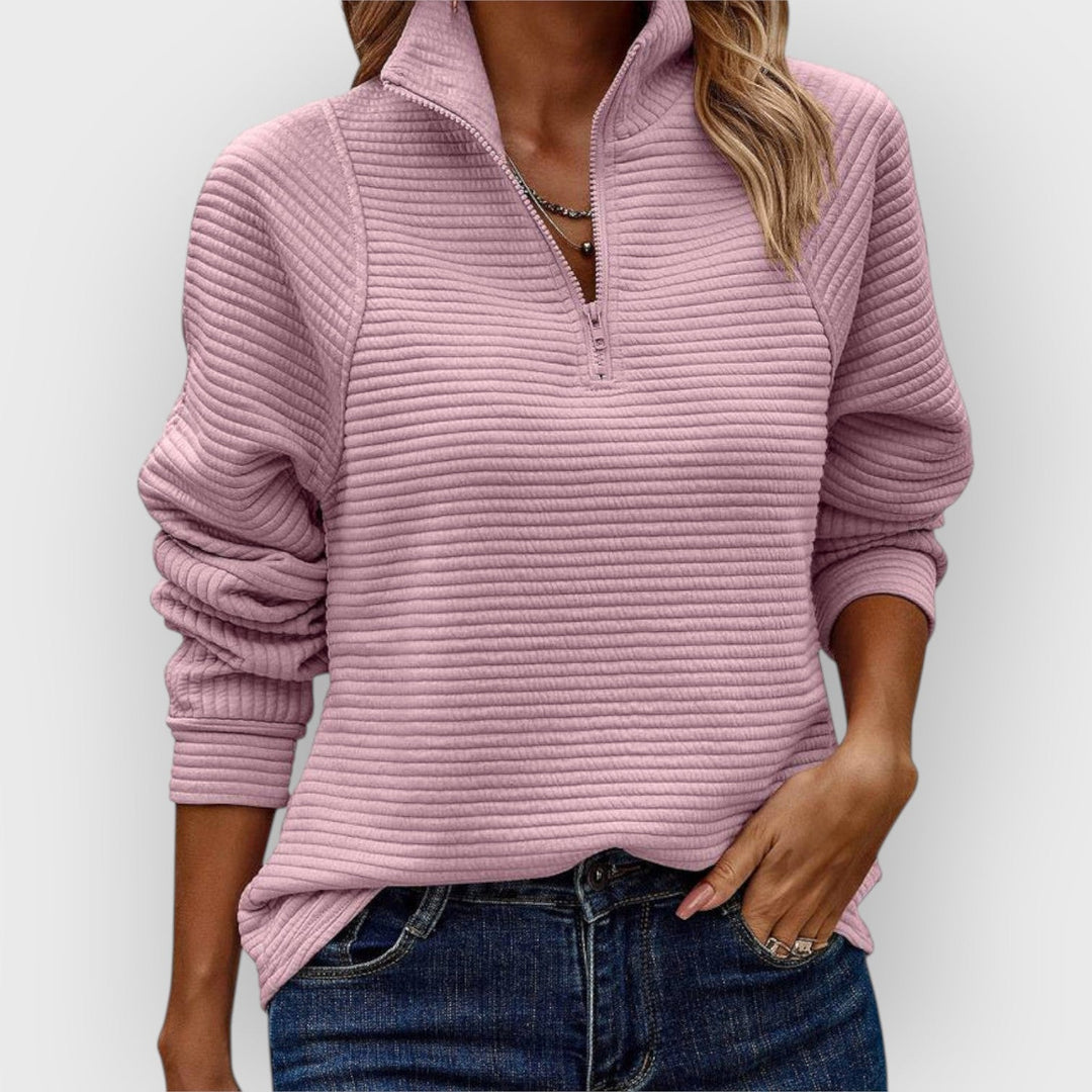 Woman's comfortable V-neck zipper sweater in soft knit, ideal for versatile fall & winter styles.