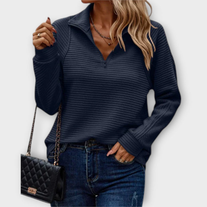 Elegant women's V-neck sweater featuring a practical zipper detail, ideal for chic fall & winter layering.