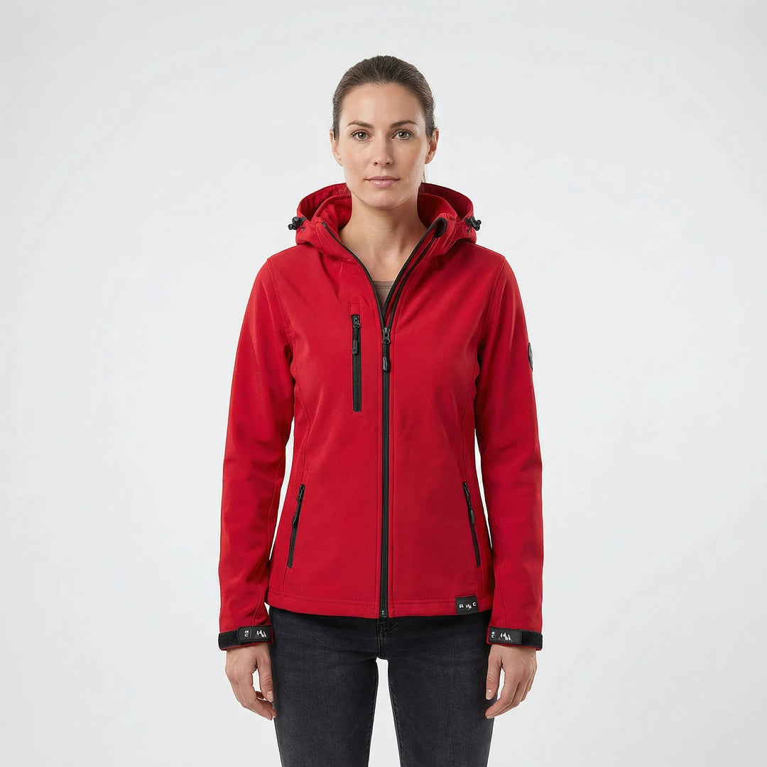 Woman wearing a black hooded softshell jacket, full zip, perfect for windproof outdoor activities & active days.
