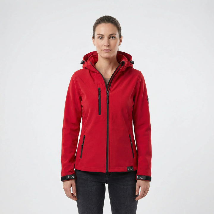 Woman wearing a black hooded softshell jacket, full zip, perfect for windproof outdoor activities & active days.