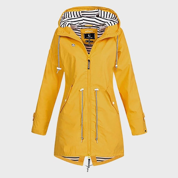 Fashionable women's long hooded rain jacket, designed for ultimate weather protection and all-weather style.