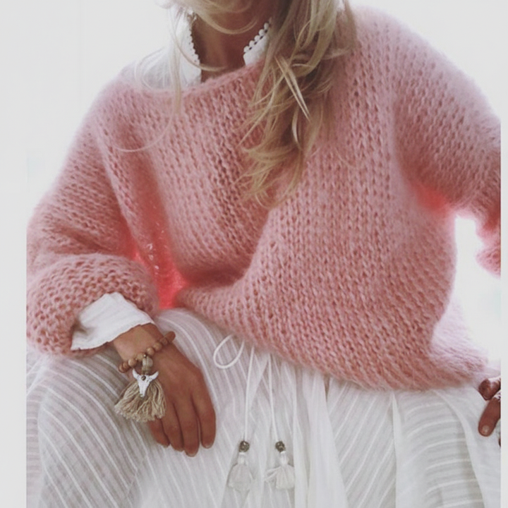 Versatile oversized knit sweater in acrylic, perfect as a loose fit spring or autumn top.