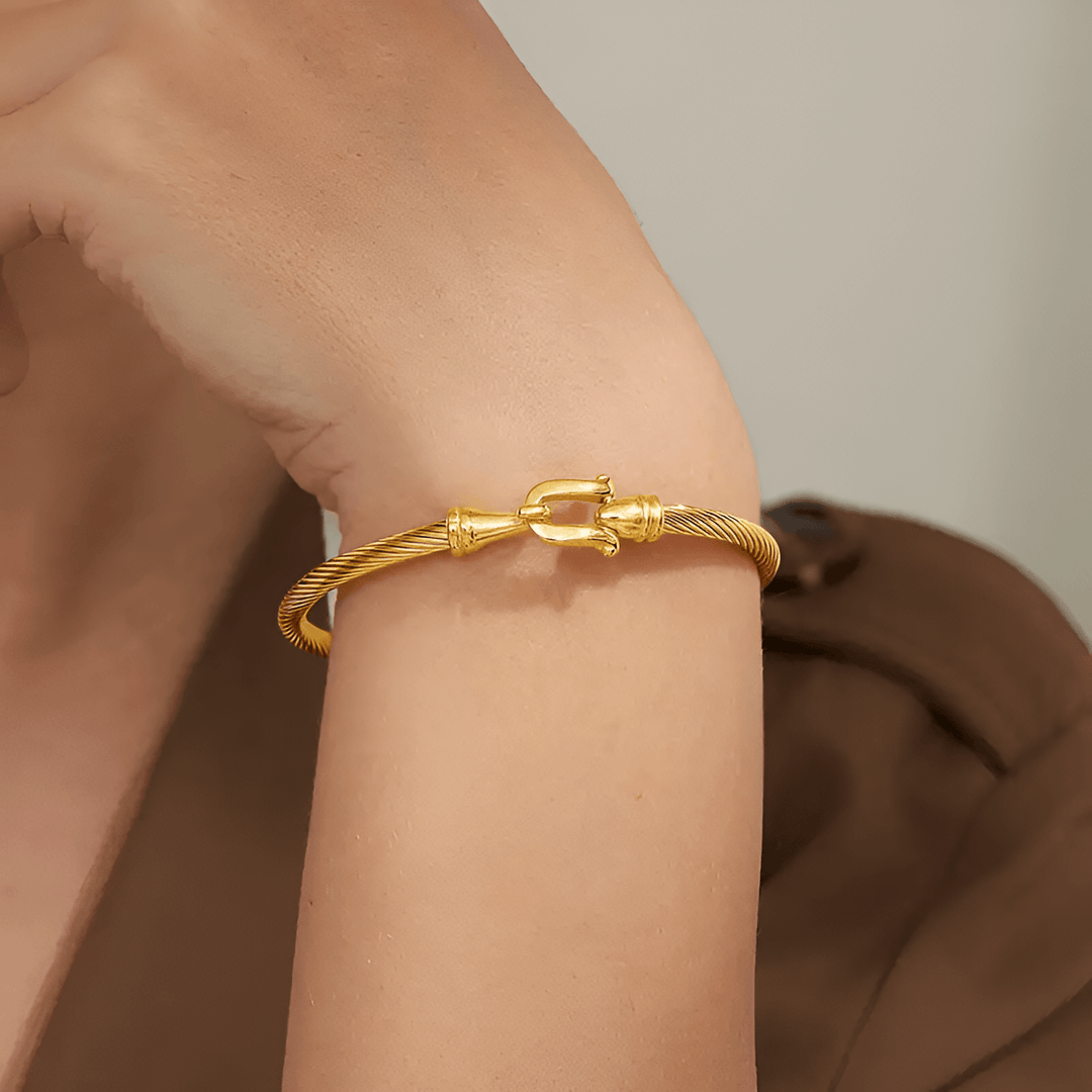 Eliana women's gold plated coil bracelet with vintage design, perfect holiday statement jewelry.