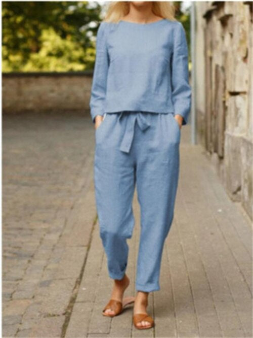 Casual women's fashion: matching round neck top and elastic waist trousers, a versatile 2-piece for all seasons.