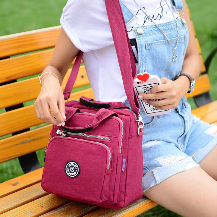 Women's 3-in-1 waterproof FlexiBag, versatile shoulder, crossbody & backpack for daily use.