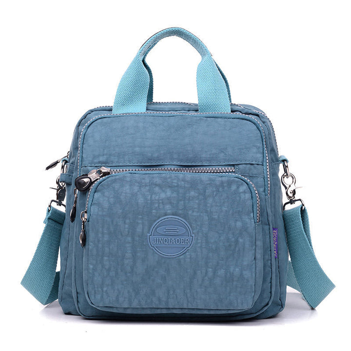 Chic women's 3-in-1 backpack, waterproof design, easily converts to a shoulder bag or crossbody.