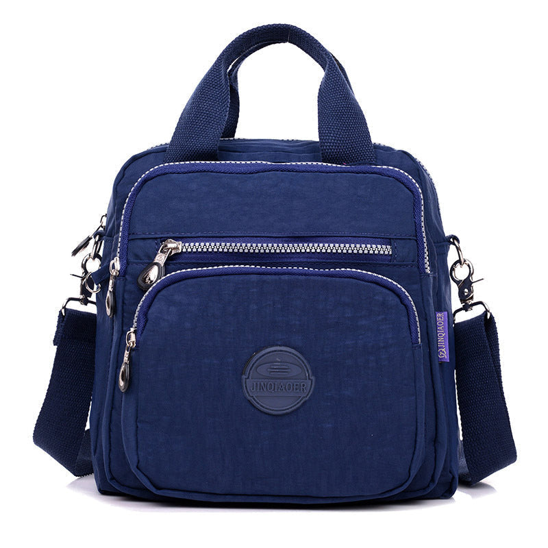 Practical women's waterproof nylon shoulder bag, multifunctional for daily needs, converts to crossbody.
