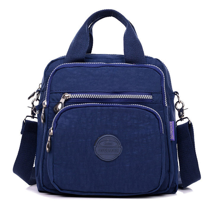 Practical women's waterproof nylon shoulder bag, multifunctional for daily needs, converts to crossbody.