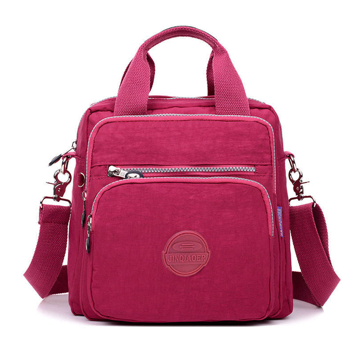Casual women's nylon travel bag, waterproof FlexiBag design, can be worn as shoulder, crossbody or backpack.