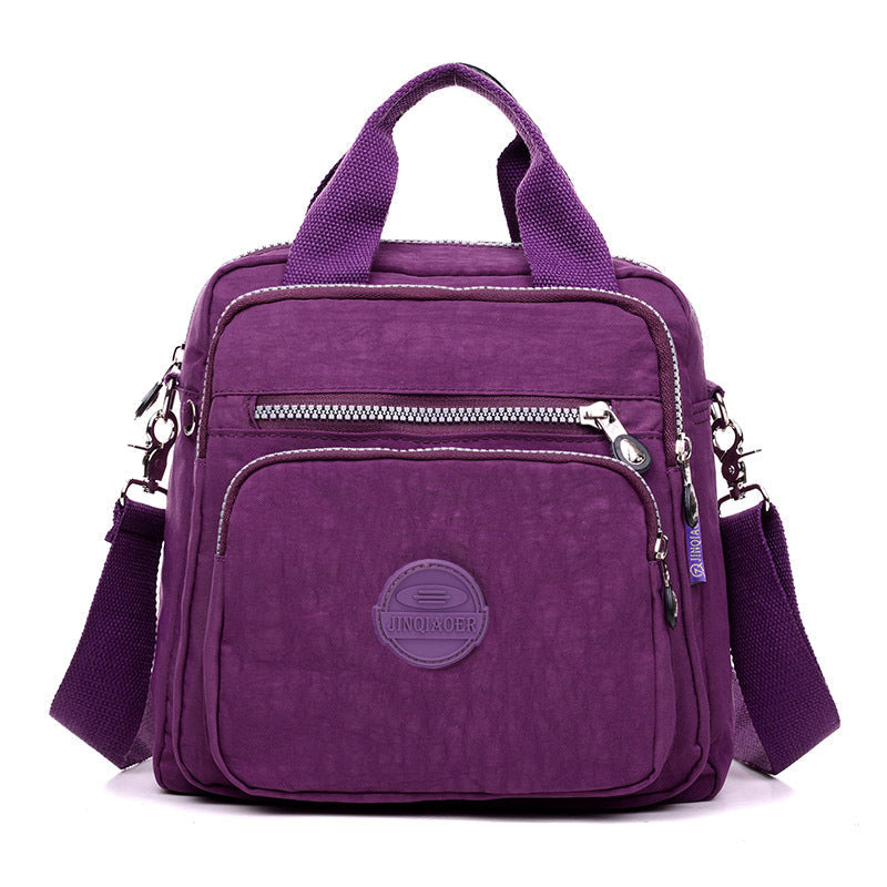 Stylish women's daily bag, waterproof & versatile, used as shoulder, crossbody or small backpack.