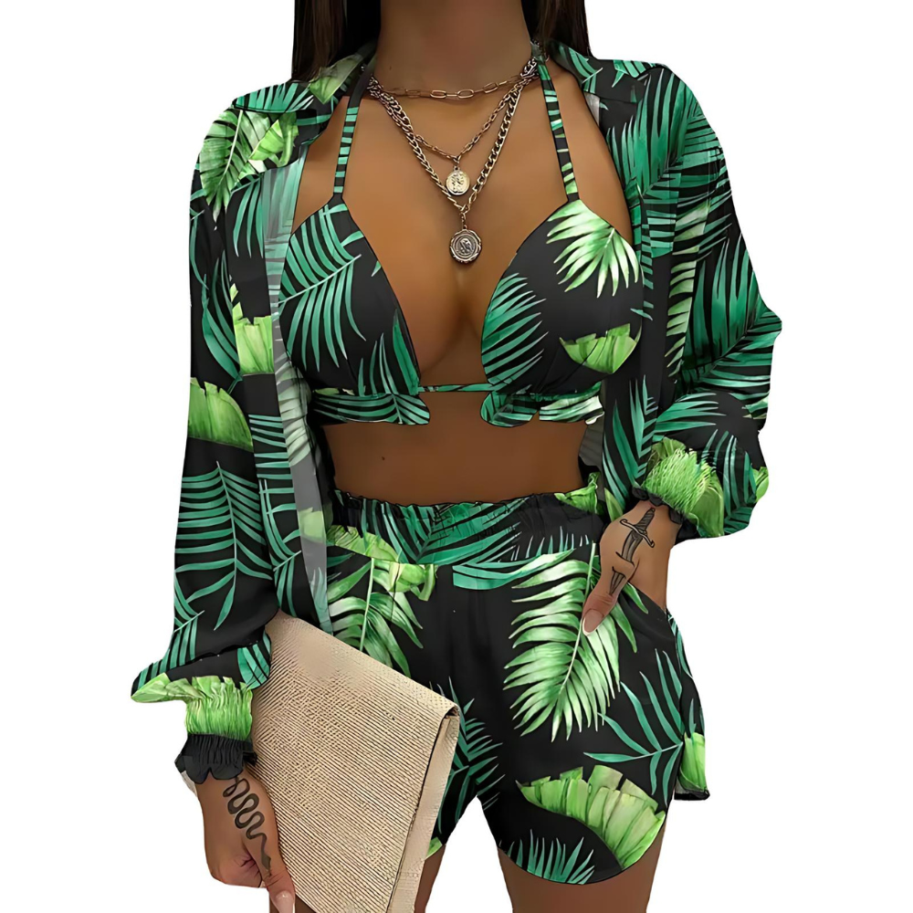 Women's 3-piece tropical bikini set with tie-front top, shorts & cover-up blouse, perfect for beach or pool.