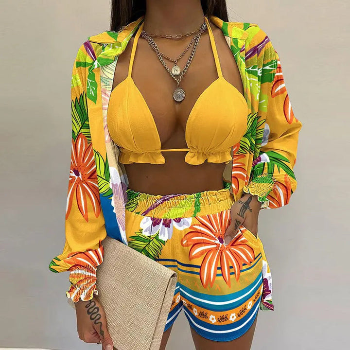 Vibrant tropical print 3-piece swimwear set for women, including bikini, shorts & lightweight cover-up.