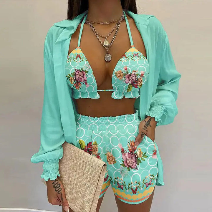 Fashionable women's 3-piece swimsuit with tropical leaf print, bandeau bikini, shorts & kimono cover-up.