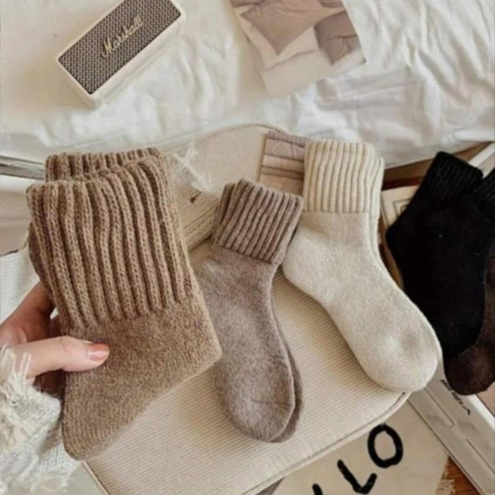 Warm women's 5-pack thermal socks. Cozy winter comfort for cold weather lounge & everyday foot warmth.