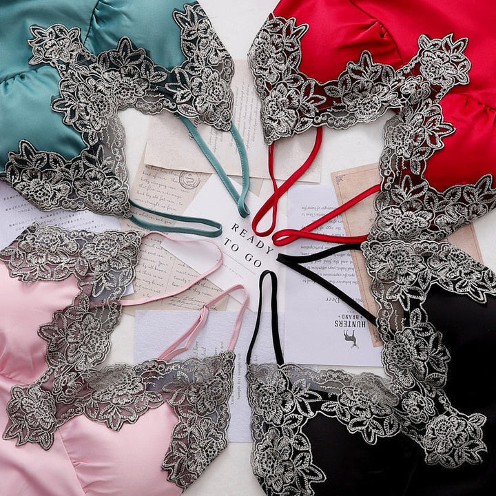 Delicate lace trim on satin camisole from luxurious women's 5-piece sleepwear set. Comfortable & feminine nightwear.