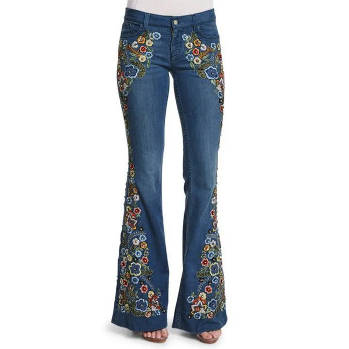 Classic women's retro 90s straight leg jeans with a light blue wash. High-waisted denim for vintage casual wear.