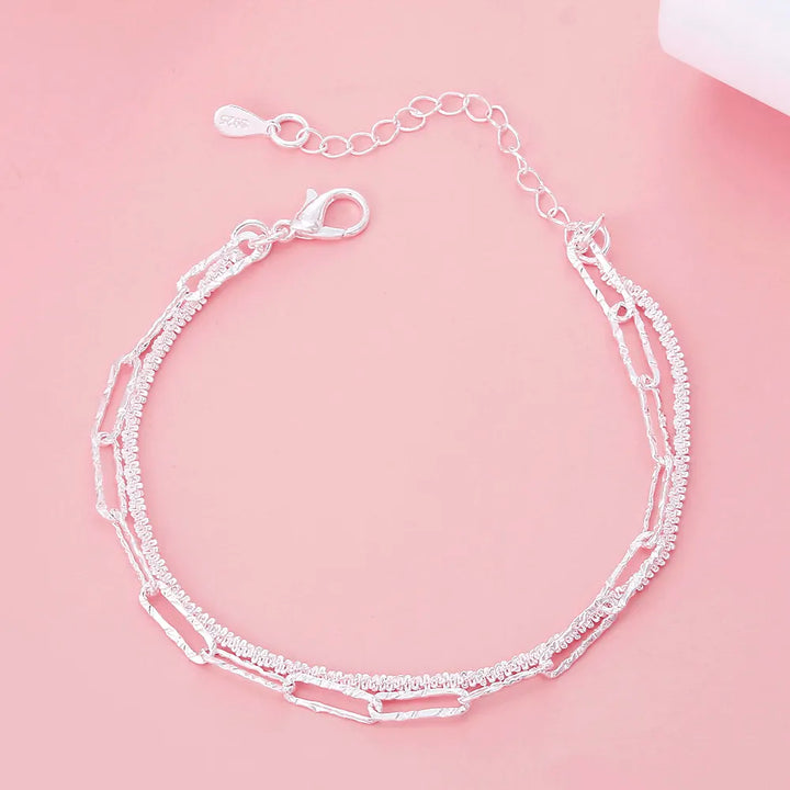 Women's 925 Sterling Silver Double Chain Bracelet. Elegant & adjustable silver jewelry, perfect fashion accessory.