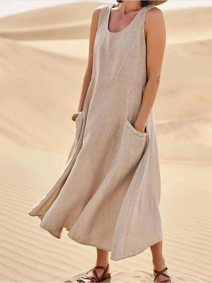 Women's A-line linen midi dress with pockets, perfect for versatile everyday wear and comfortable, chic style.
