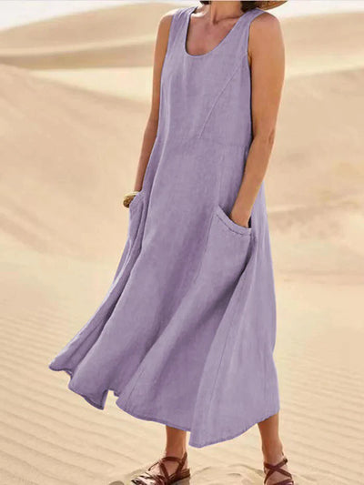 Elegant women's A-line linen dress with functional pockets, a versatile midi style for chic and comfortable everyday wear.