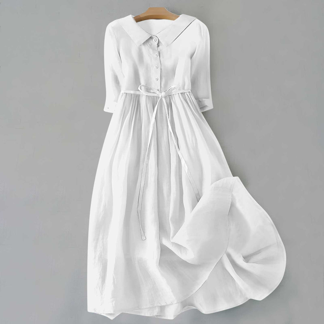 Everyday women's A-line dress, midi length, short sleeves. Comfortable and stylish for casual wear.