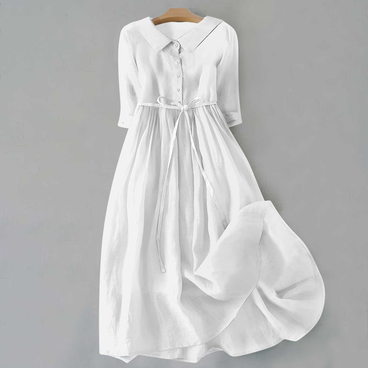 Everyday women's A-line dress, midi length, short sleeves. Comfortable and stylish for casual wear.