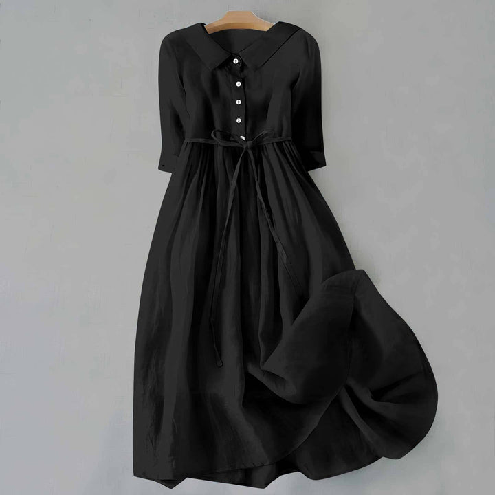 Chic A-line midi dress for women with short sleeves. Ideal comfortable casual summer outfit.