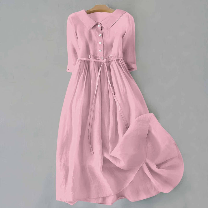 Flattering A-line casual dress, midi length & short sleeves. A versatile comfortable women's summer staple.