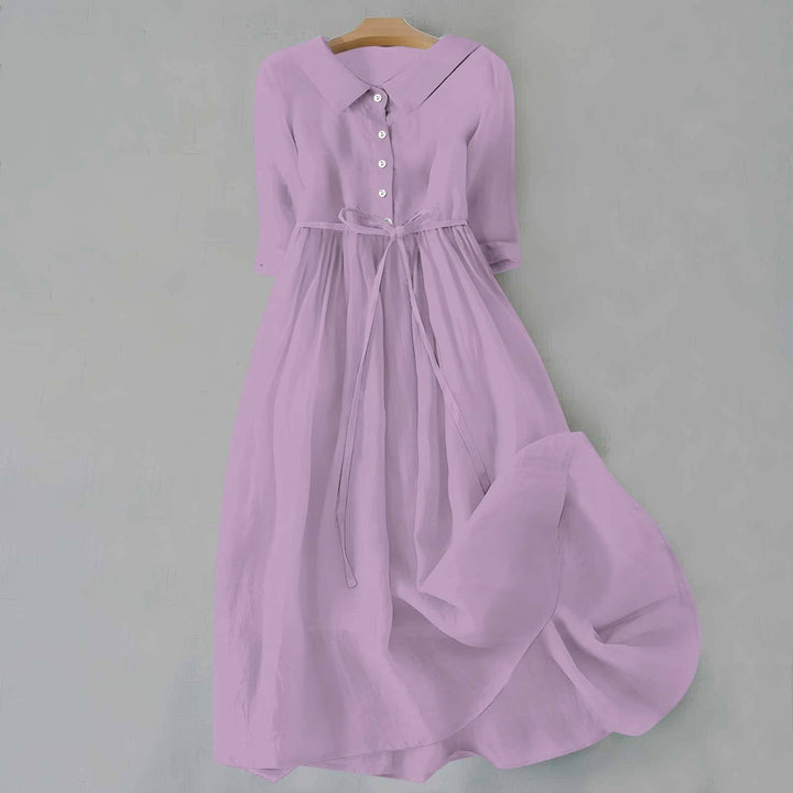 Stylish women's short-sleeve A-line midi dress, great for versatile casual everyday comfort.