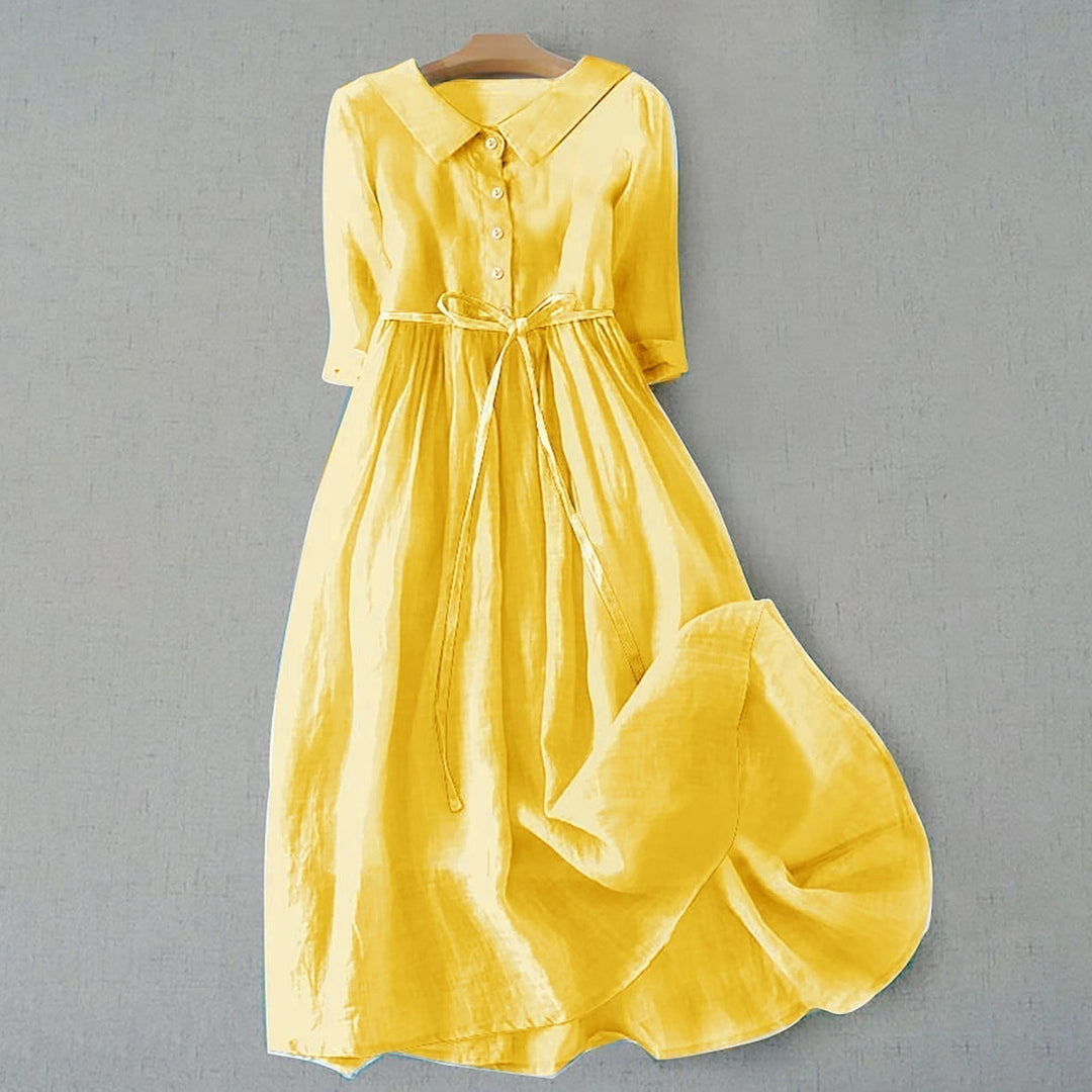 Elegant casual A-line women's dress, midi cut & short sleeves. Comfortable & versatile for daily wear.