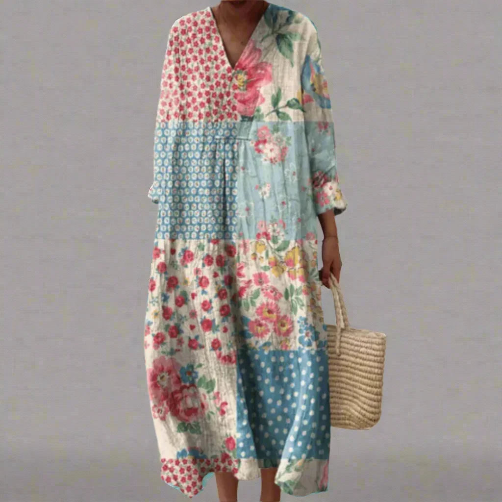 Women's abstract patchwork midi dress with vibrant prints, flowy bohemian style for comfortable summer wear.