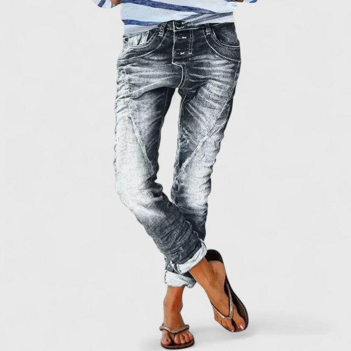 Stylish women's acid wash skinny jeans, vintage wash, with bold contrast stitching, ideal for casual outfits.