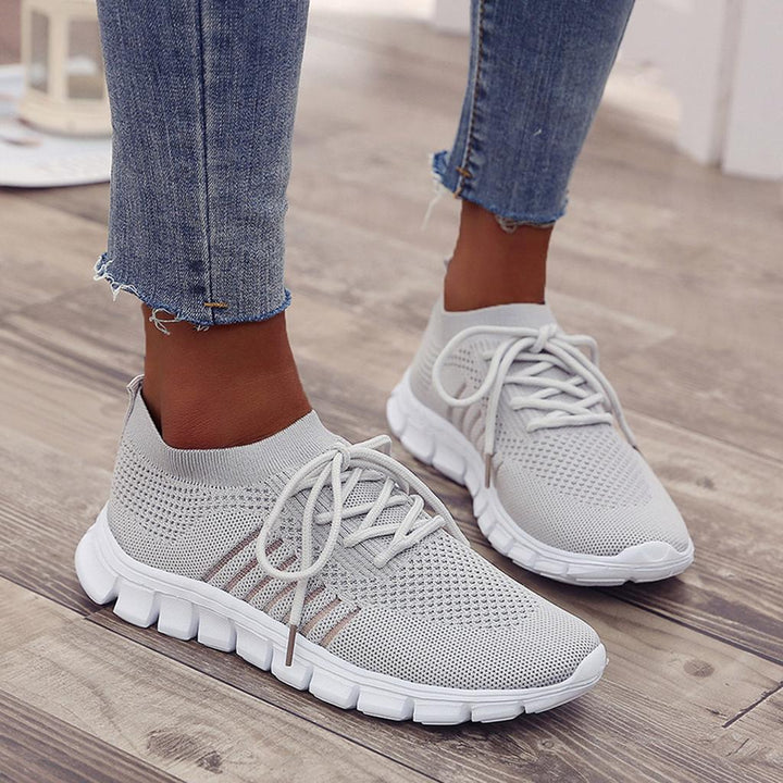 Durable anti-slip women's sneakers, offering superior grip & all-day comfort.
