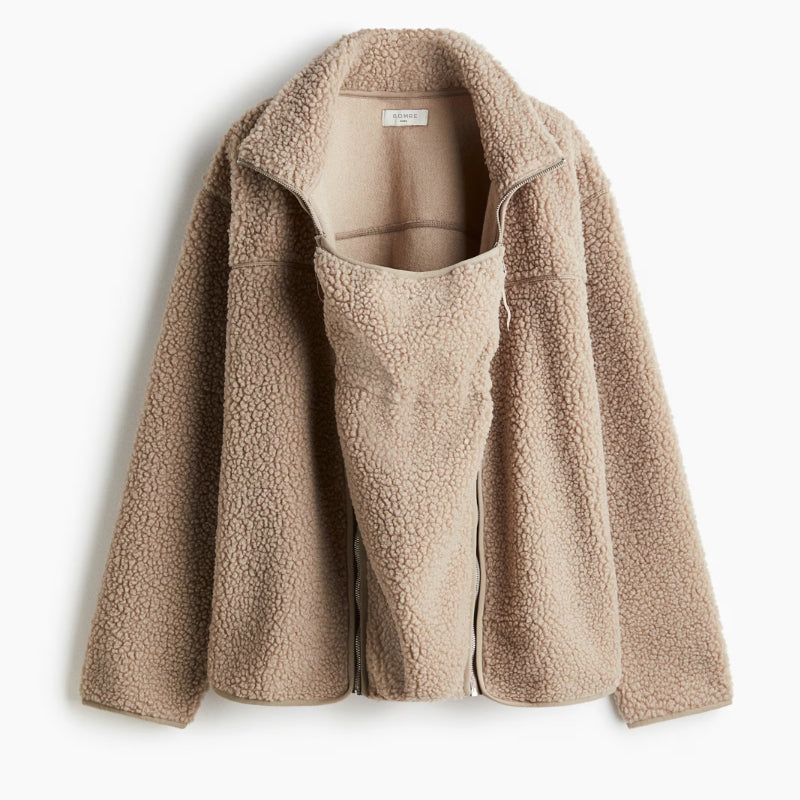 Soft, fuzzy texture of a women's adaptive plush jacket, highlighting its cozy and warm material.