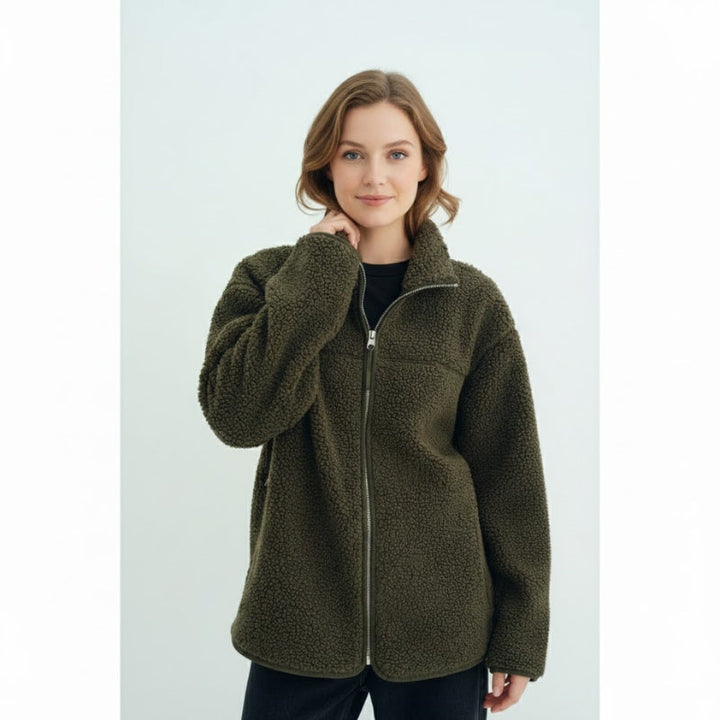 Back view of a woman wearing a versatile women's plush jacket, suitable for postpartum and outerwear.