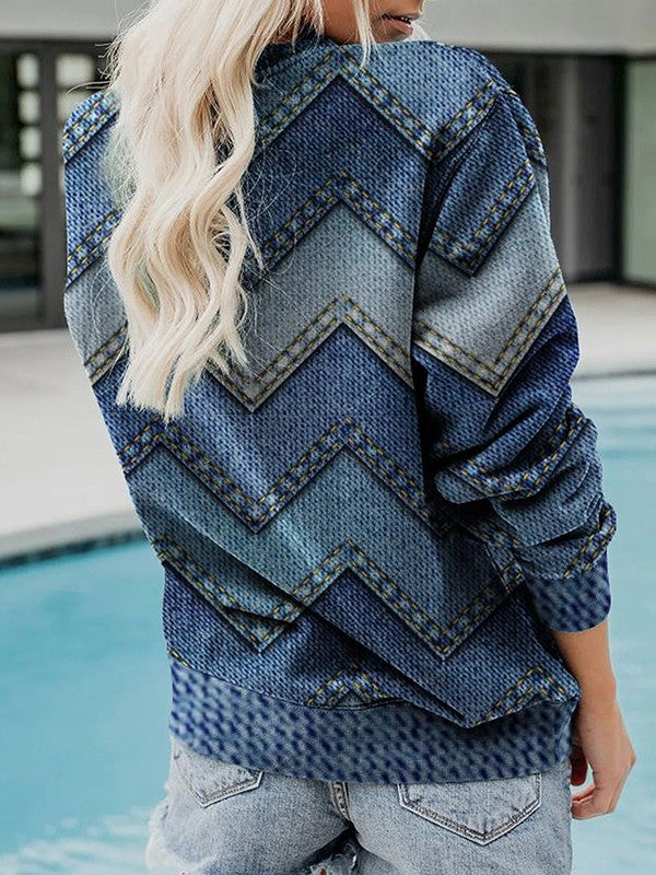Stylish women's blue geometric round neck pullover sweater, a versatile long sleeve top for contemporary fashion.
