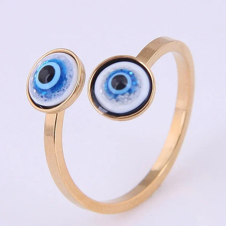Stylish adjustable evil eye ring for women, a gold-plated sterling silver statement piece for protection & fashion.