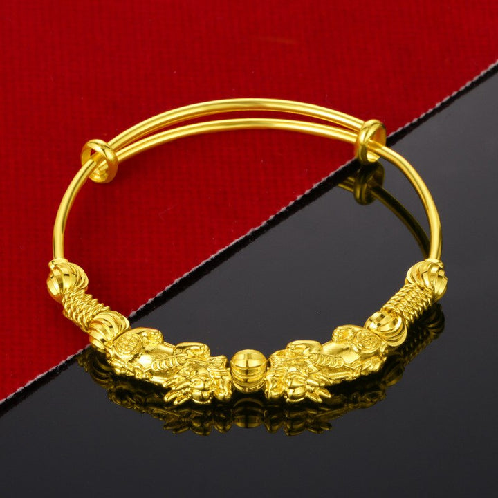 Dainty gold charm bracelet for women, adjustable fit, featuring a stylish good luck charm.