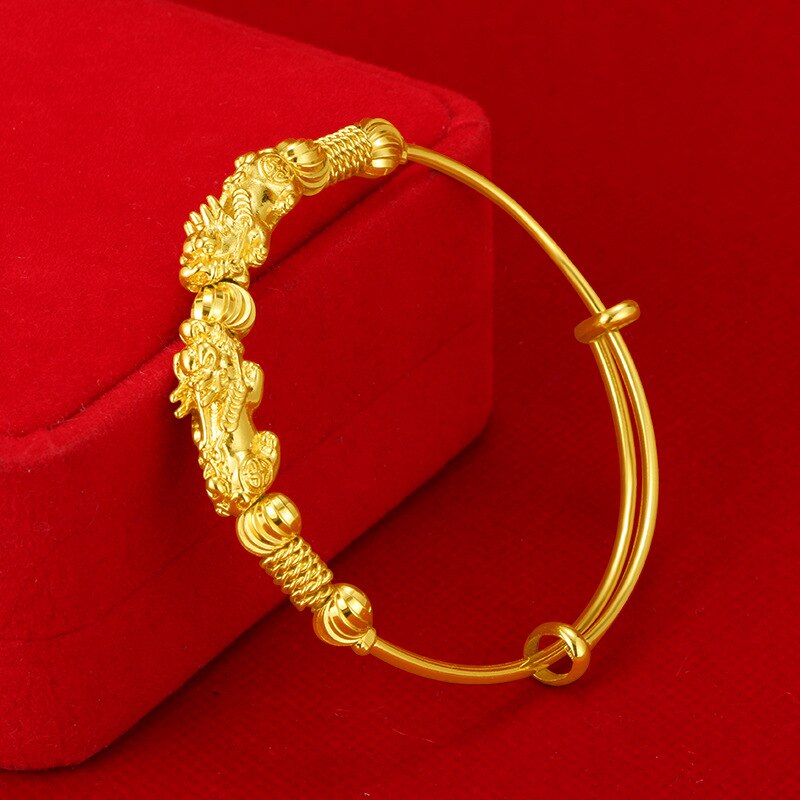 Elegant gold adjustable charm bracelet, a perfect good luck gift for her, versatile women's jewelry.