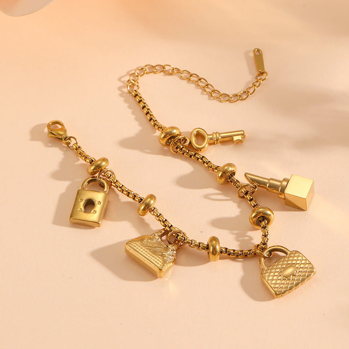 Gold & silver finish women's adjustable charm bracelet with sparkling rhinestones. Elegant fashion jewelry.