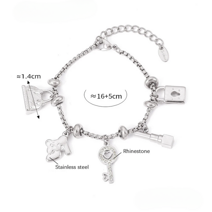 Fashionable women's wrist charm bracelet, adjustable gold & silver design, shimmering rhinestones.