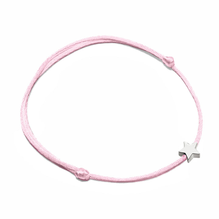 Women's flexible nylon bracelet with a charming metal star, easily adjustable for any wrist.