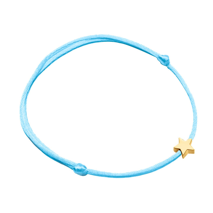 Elegant women's star charm bracelet, a versatile accessory with adjustable nylon and metal detail.