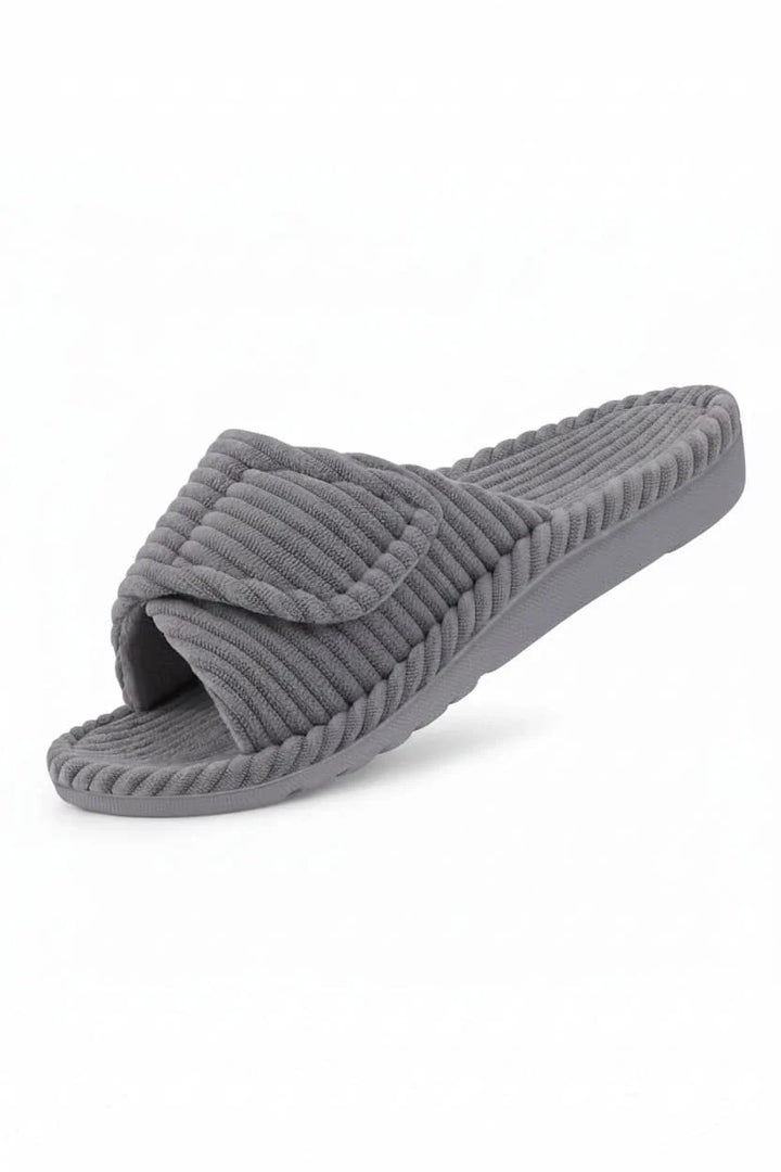 Side profile of women's slip-on open toe comfort slippers, showcasing their casual indoor design.