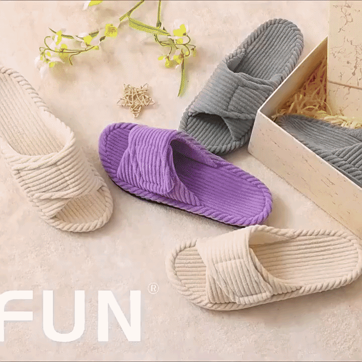 Pair of women's adjustable open toe comfort slippers, ultimate cozy slip-on footwear for relaxing.